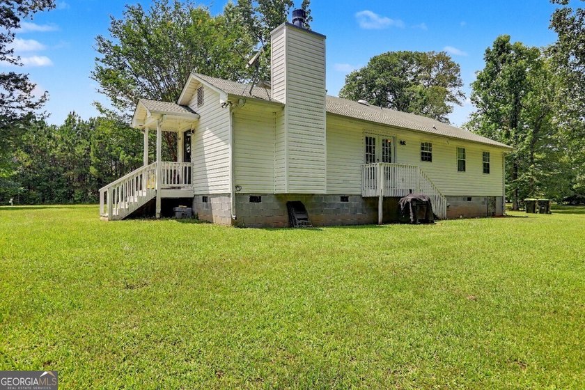Welcome home to this charming ranch-style property offering the - photo 6