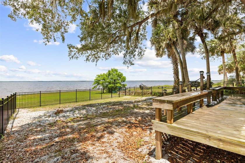 Nestled on a breathtaking .4-acre lot on beautiful Lake Harney - photo 22