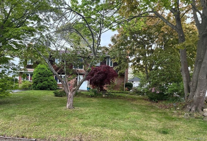 This Colonial Style Home Features 4 Bedrooms, 2 Full Baths - photo 3