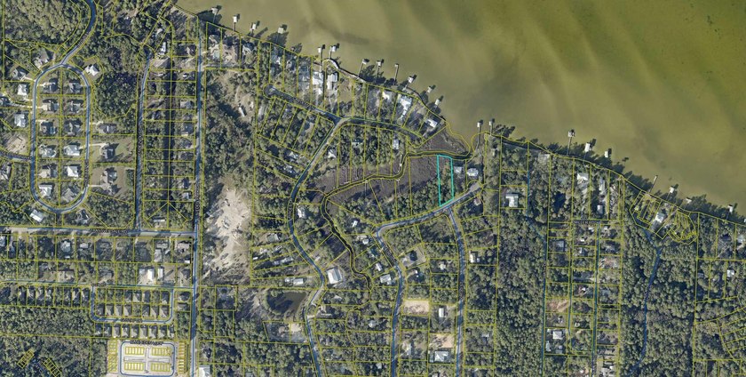 Canal Front Lot with wide open Bay views. This lot offers the - photo 2