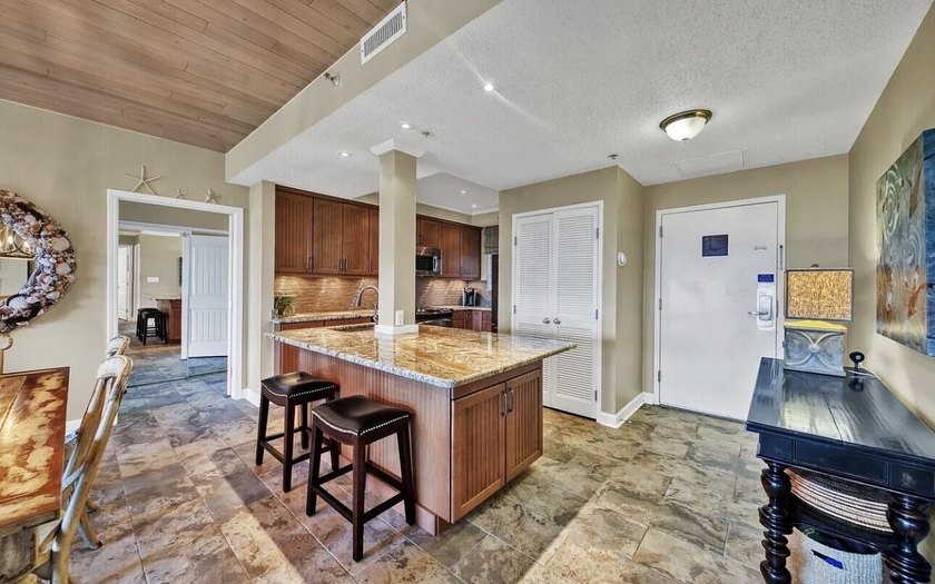 This spacious, 10th floor, open layout is one of the best on the - photo 25