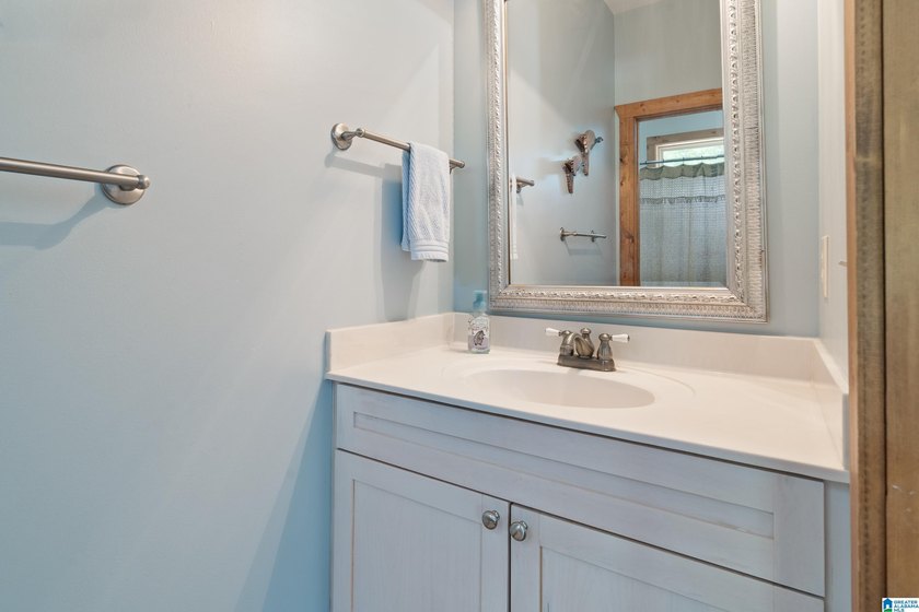 Beautiful 3-bedroom, 3 1/2 bath lakefront home that truly has it - photo 29