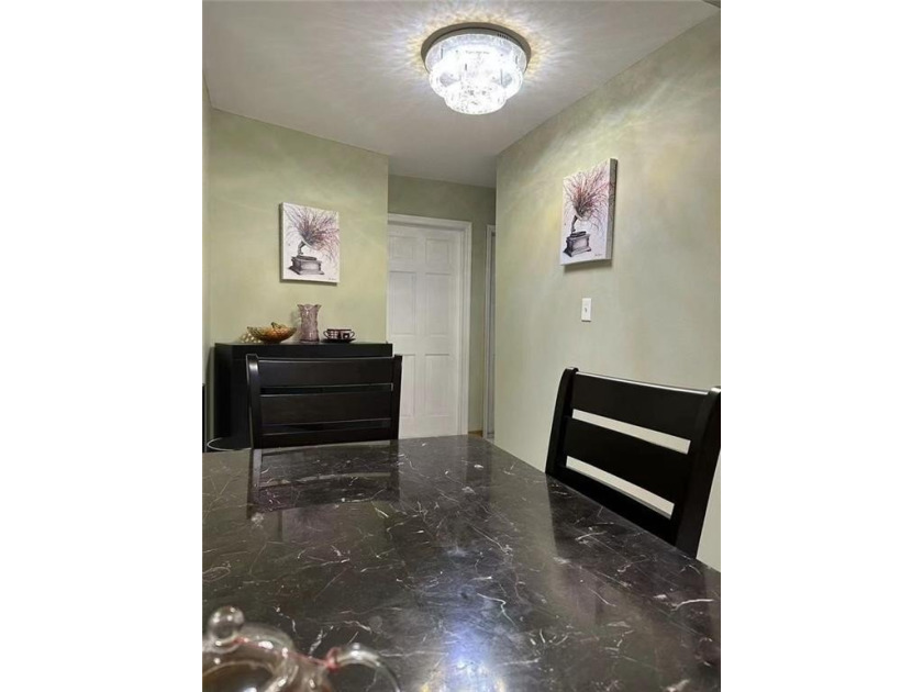 Rare opportunity! Oversized brick two-family home measuring 20' - photo 8
