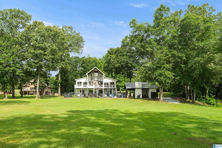 Beautiful 3-bedroom, 3 1/2 bath lakefront home that truly has it - photo 49