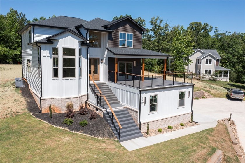 Experience the perfect blend of modern design and lakeside - photo 2