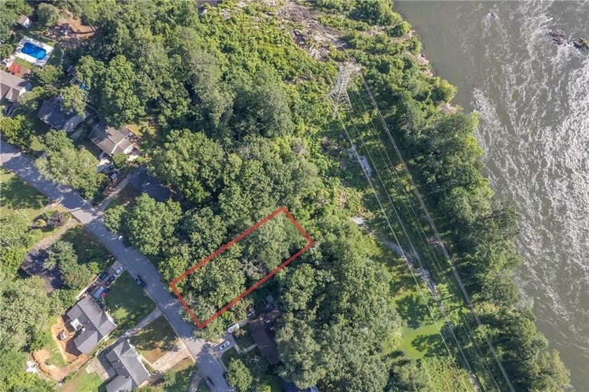 Set along the banks of the Chattahoochee River, this rare - photo 2