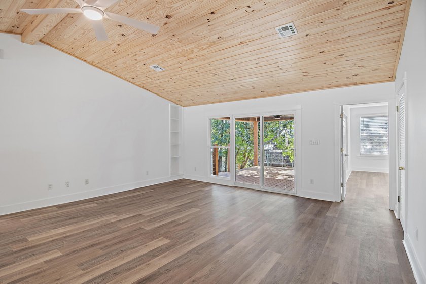 75' of canal frontage sets the stage for easy waterfront living - photo 7