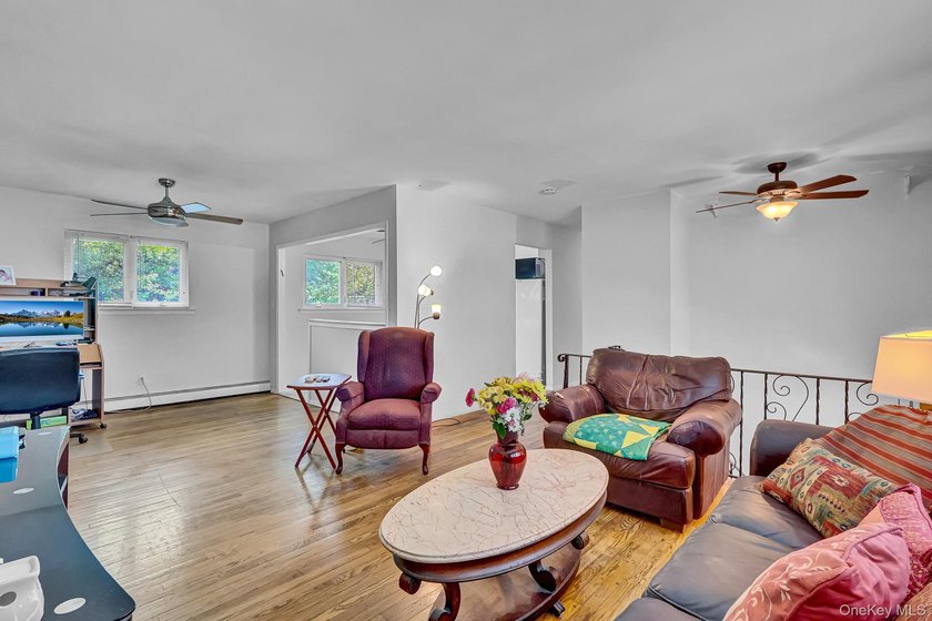 Wide-Line High Ranch featuring 4-5 bedrooms, 2 Full Baths, a Den - photo 9