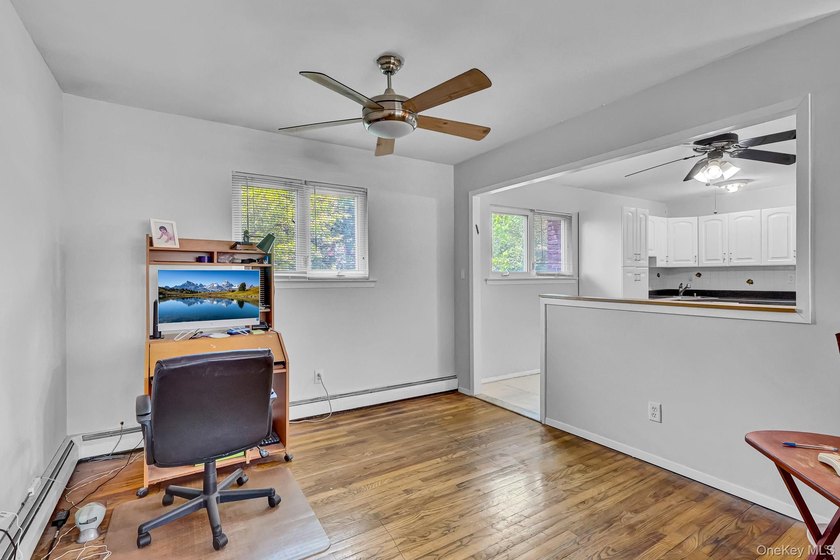 Wide-Line High Ranch featuring 4-5 bedrooms, 2 Full Baths, a Den - photo 10