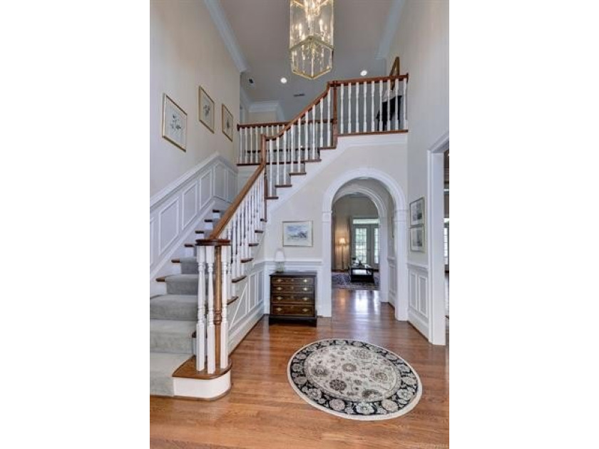 This all-brick colonial sits on a private end lot and offers a - photo 3