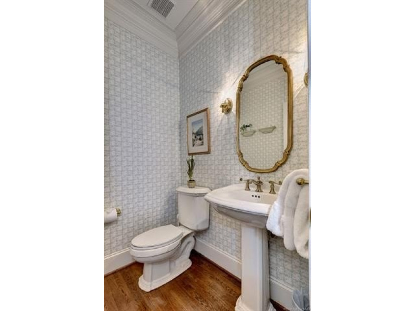 This all-brick colonial sits on a private end lot and offers a - photo 5