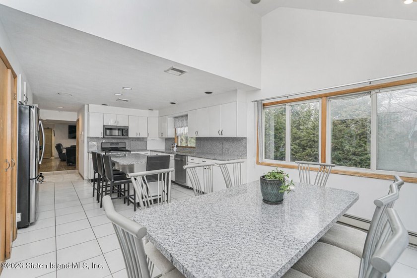 This Stunning 2-Family Contemporary Home Nestled in the - photo 5
