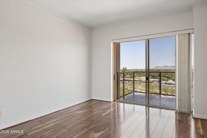 Elevated 9th floor living awaits in this updated end unit. Enjoy - photo 13