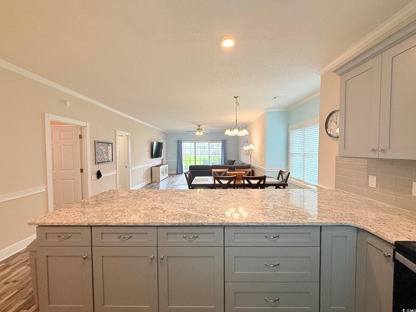 Fully Remodeled, First Floor, Corner End Unit with a Private One - photo 14