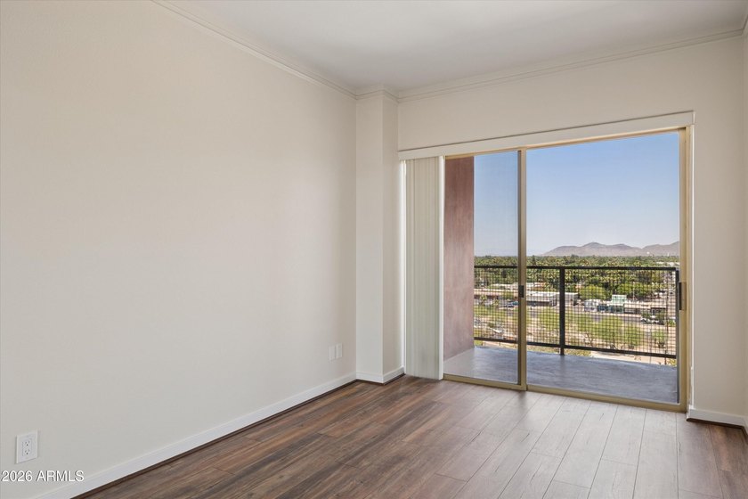 Elevated 9th floor living awaits in this updated end unit. Enjoy - photo 16