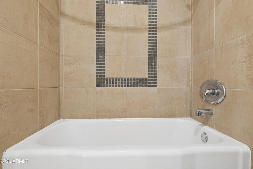 Elevated 9th floor living awaits in this updated end unit. Enjoy - photo 20