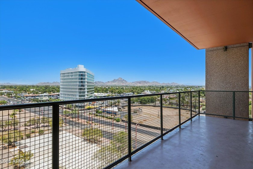 Elevated 9th floor living awaits in this updated end unit. Enjoy - photo 21