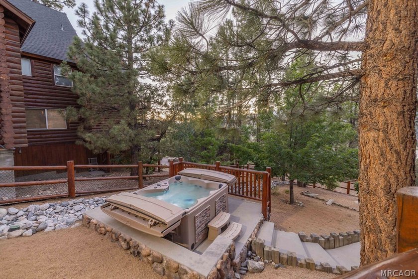 Nestled at the end of a quiet cul-de-sac in the highly desirable - photo 4