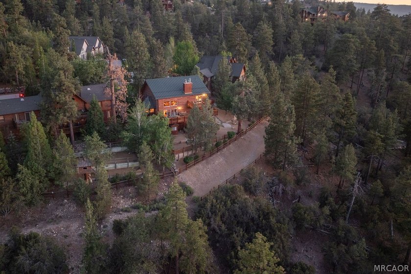 Nestled at the end of a quiet cul-de-sac in the highly desirable - photo 8