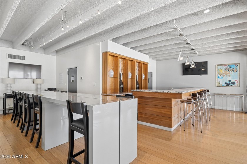 Elevated 9th floor living awaits in this updated end unit. Enjoy - photo 36
