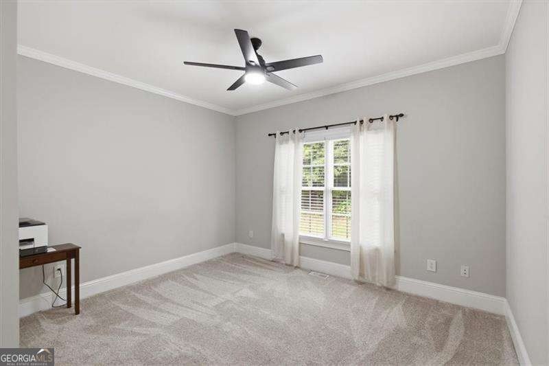 Minutes from Lake Allatoona, tucked on 3.42 private acres, this - photo 5