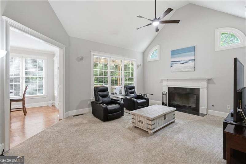 Minutes from Lake Allatoona, tucked on 3.42 private acres, this - photo 6