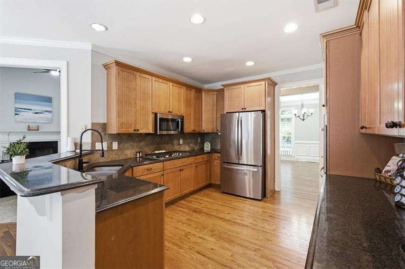 Minutes from Lake Allatoona, tucked on 3.42 private acres, this - photo 10