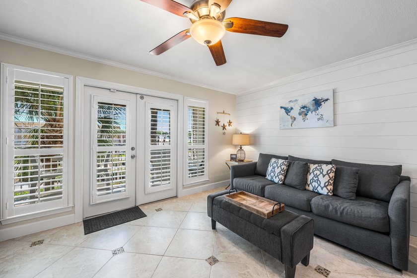 Welcome to Grand Caribbean West Unit 214, a turnkey, fully - photo 4