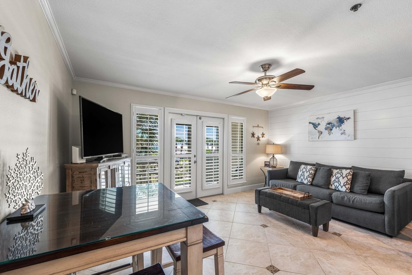 Welcome to Grand Caribbean West Unit 214, a turnkey, fully - photo 5