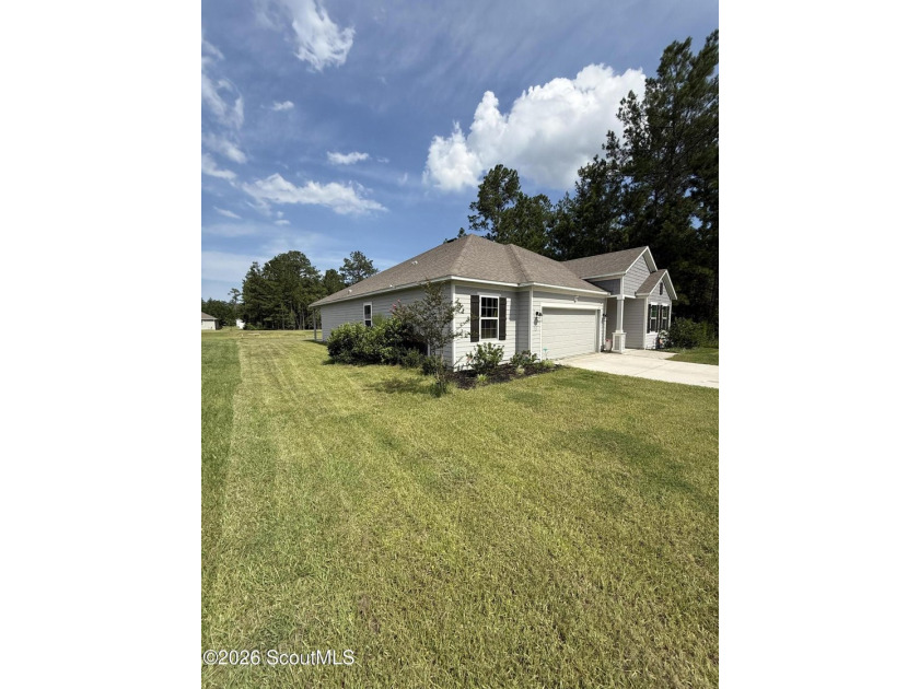 Welcome to effortless coastal living in the sought-after gated - photo 4
