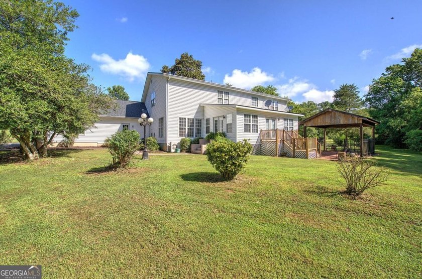 Nestled on 2.83 beautifully landscaped acres surrounded by - photo 43