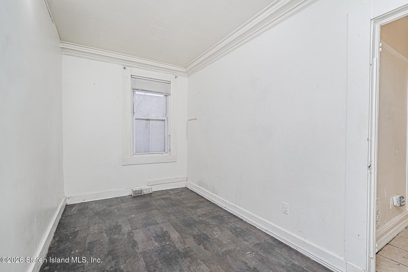 Opportunity knocks at 269 Pulaski Avenue-a solid two-family - photo 9