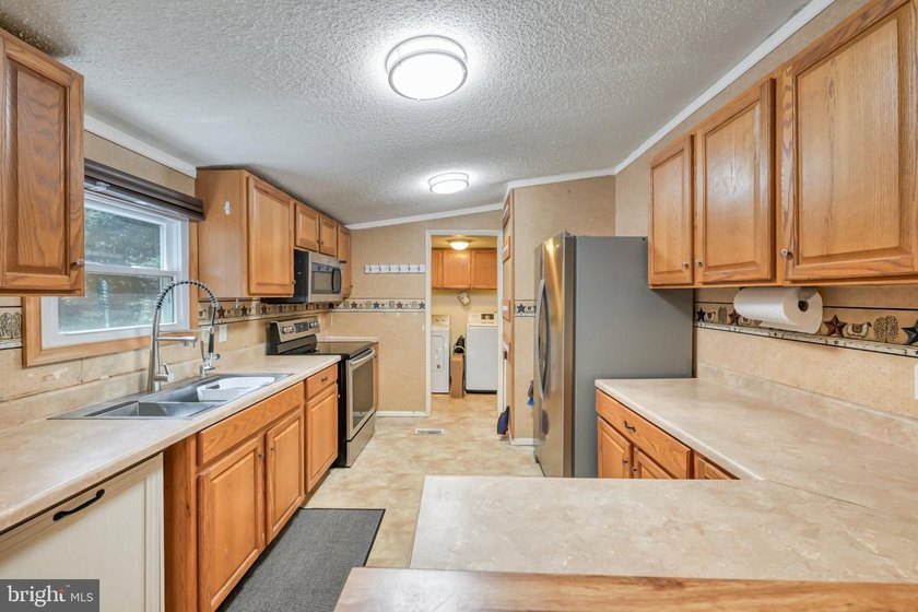 Nestled in the peaceful Halwick Estates community, this - photo 20