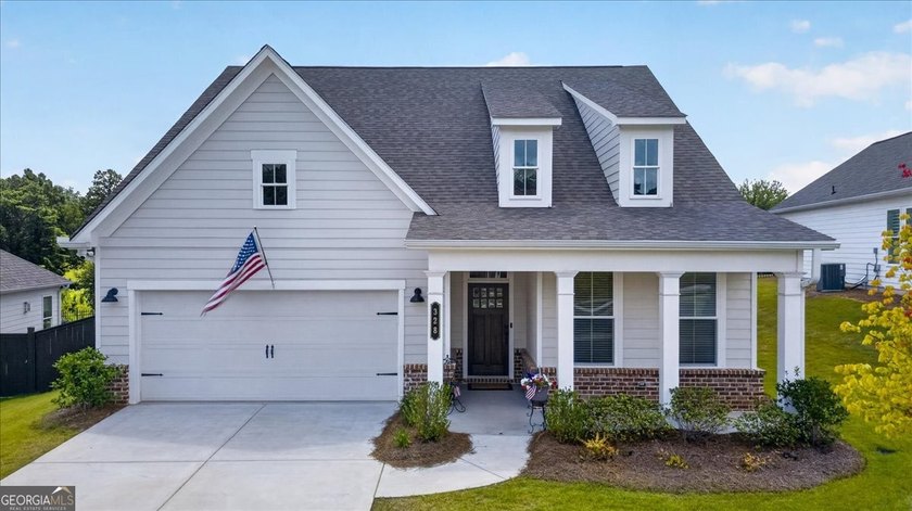 Welcome to 328 McQueen Way in Courtyards at Hickory Flat, a - photo 2