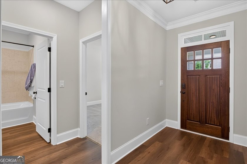 Welcome to 328 McQueen Way in Courtyards at Hickory Flat, a - photo 6
