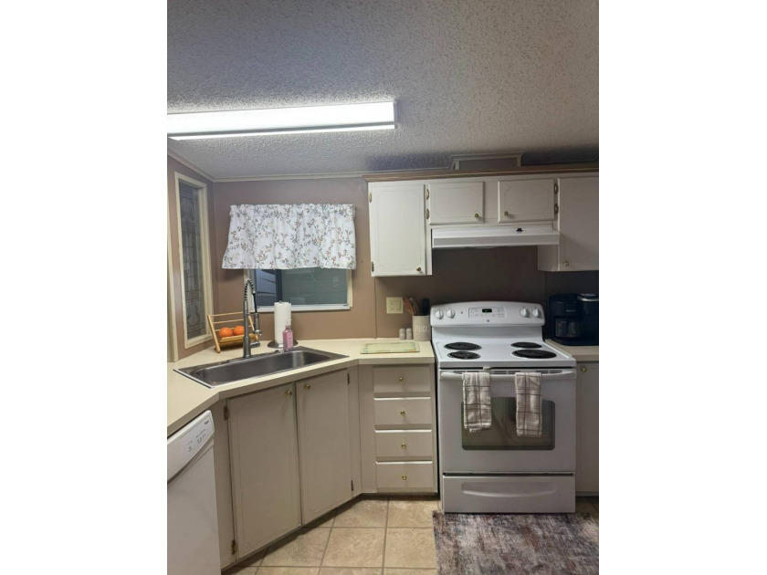 This home offers a lot of bang for the buck! Well maintained - photo 12