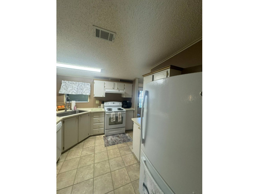 This home offers a lot of bang for the buck! Well maintained - photo 13