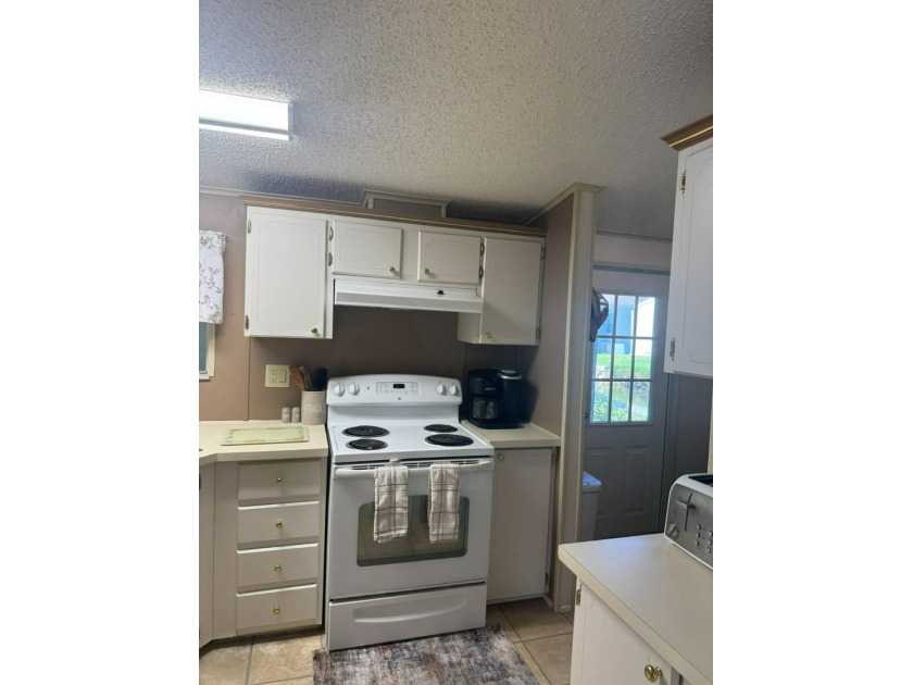 This home offers a lot of bang for the buck! Well maintained - photo 14
