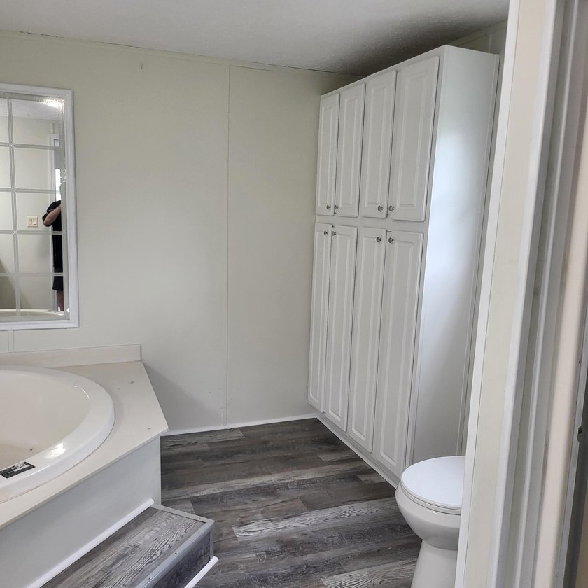 Welcome to this 1,900-square-foot mobile home situated on 5 - photo 15