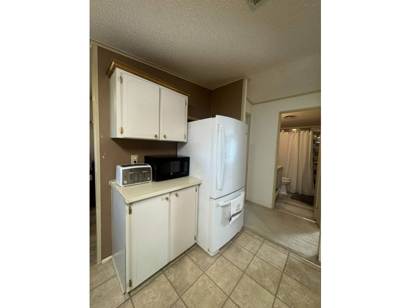 This home offers a lot of bang for the buck! Well maintained - photo 15