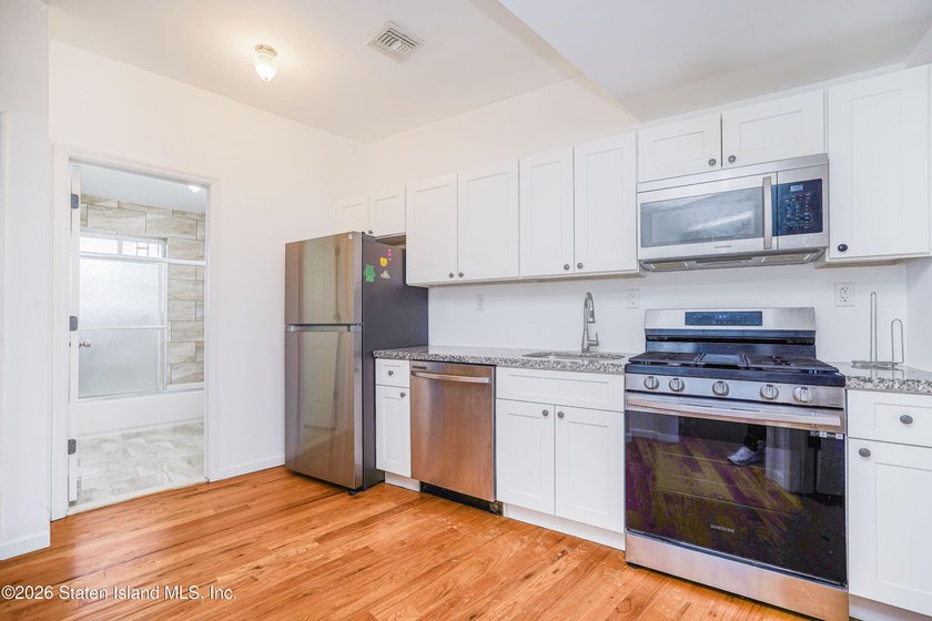 Exceptional investment opportunity at 210 Corson Ave! This fully - photo 3