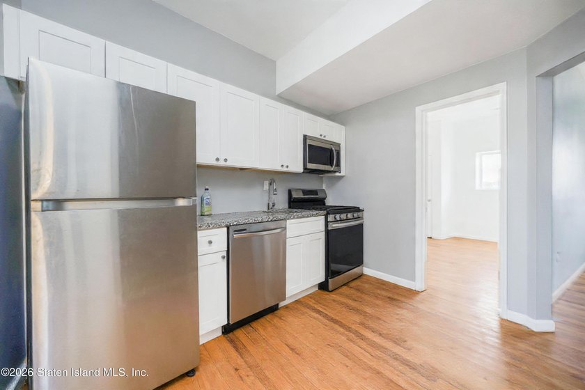Exceptional investment opportunity at 210 Corson Ave! This fully - photo 4