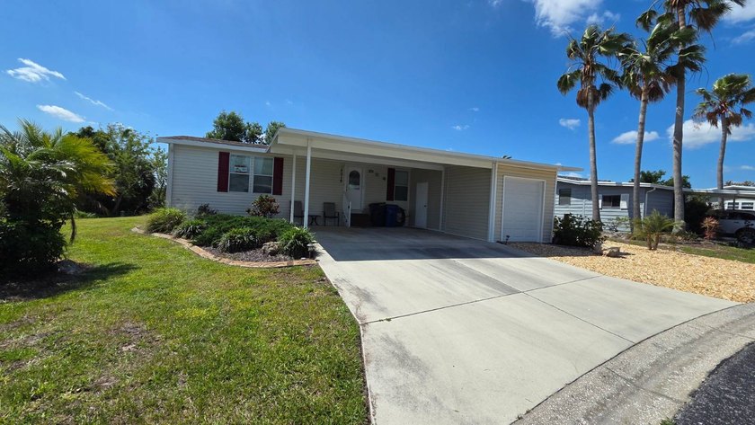 PRICE REDUCTION!! Welcome to this charming 2010 Manufactured - photo 2