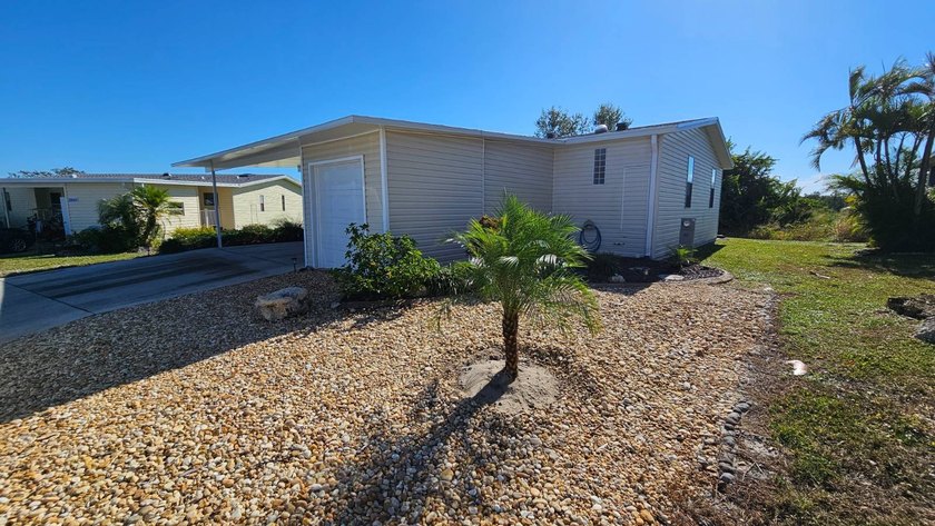 PRICE REDUCTION!! Welcome to this charming 2010 Manufactured - photo 3