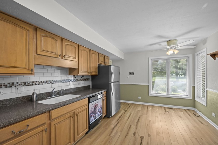 Step into this easy living U shaped ranch in truly one of the - photo 8