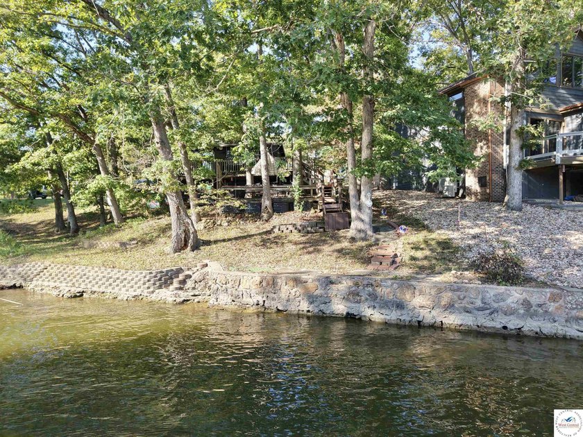 Discover the potential of this quaint two-bedroom cabin, nestled - photo 7