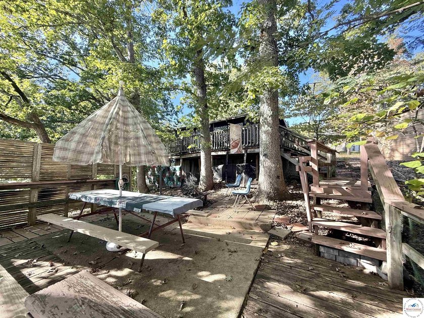 Discover the potential of this quaint two-bedroom cabin, nestled - photo 8