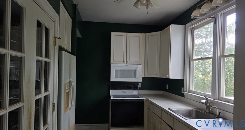 Great potential in this 7.6 acre rural waterfront retreat in the - photo 4