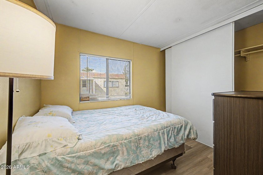 Welcome home! This charming 3-bedroom, 2-bath mobile home greets - photo 23