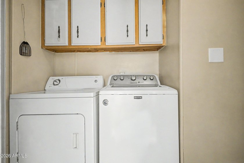 Welcome home! This charming 3-bedroom, 2-bath mobile home greets - photo 28